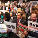 California educators protest DeVos at a teachers’ association meeting in January. (AP Photo/Reed Saxon)
